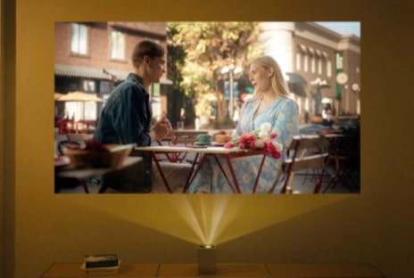 Video of two people talking projected by LG CineBeam