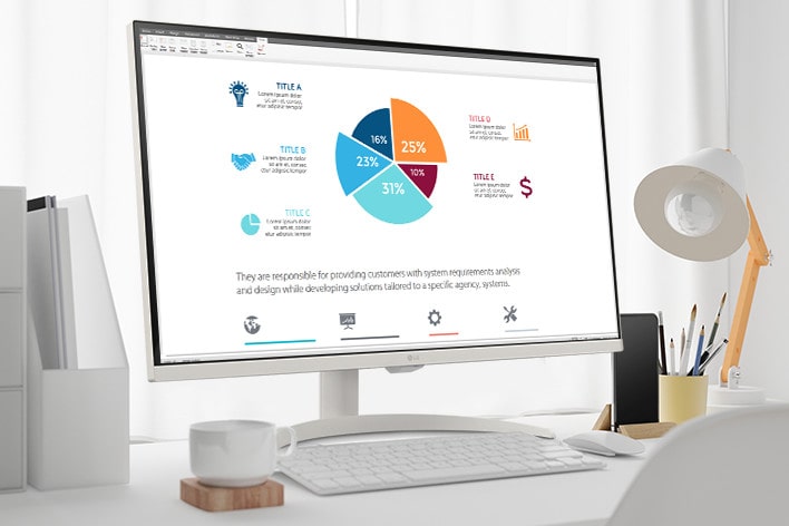 On the table, there is a smart monitor, displaying a home office document being worked on. To the left of the monitor, there is a cup with a handle, and to the right, there is a mobile phone, a pencil holder, and a stand.