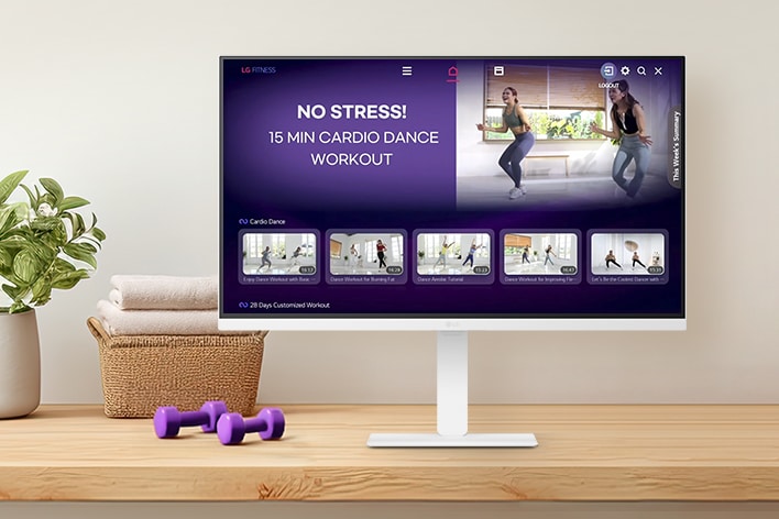 The LG Smart Monitor screen is showing various LG Fitness videos.