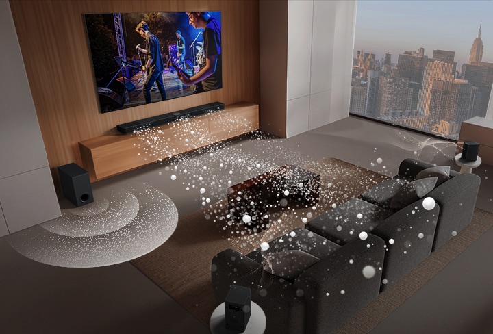 LG Soundbar, LG TV, rear speakers and a subwoofer are in a living room of a skyscraper, playing a musical performance. White soundwaves made up of droplets project from the soundbar and a subwoofer is creating a sound effect from the bottom.