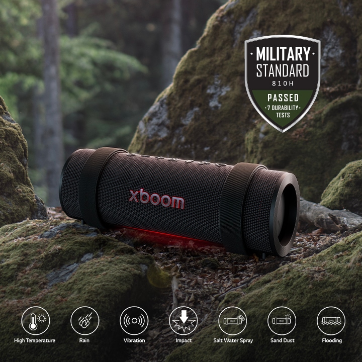 xboom Grab is placed on rock covered with moss. On the above right side Military standard logo is placed.
