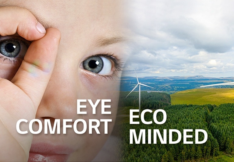 A closeup of a child's eye on the left and a sceneary of the field with windmills.