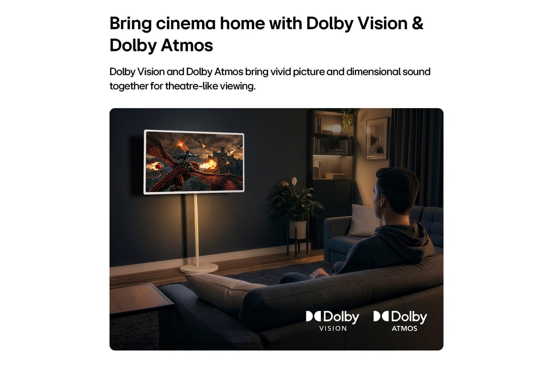 LG StanbyME 2 Max LX6 Movable Screen with a Built-in Battery stands among wooden furniture in a stone-walled courtyard, supporting over four hours of playback in one charge for flexible viewing without a power connection.