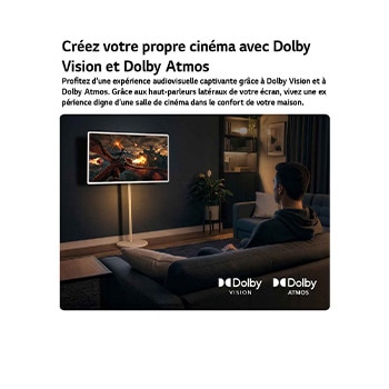 LG StanbyME 2 Max LX6 Movable Screen with Dolby Vision & Dolby Atmos shows a man watching a cinematic dragon battle in a dark room, where lifelike visuals and immersive sound create a theater-like experience at home.