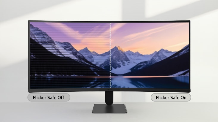 LG ultra-wide monitor displaying a split-screen comparison of a mountain landscape, with the left side showing screen flicker and the right side showing a clear, flicker-free image