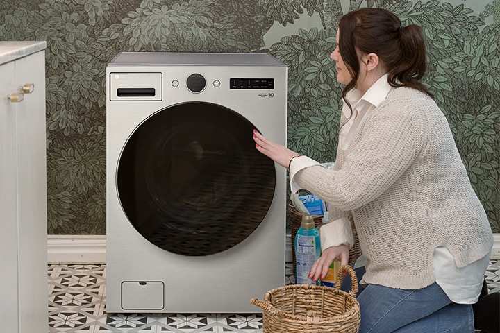 The video shows the woman putting laundry into the washing machine, the woman operating the washing machine, and the washing machine button.