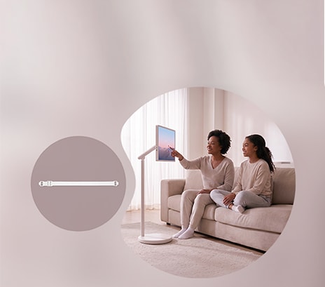 Mother and daughter comfortably use the StandbyME 2 in the living room