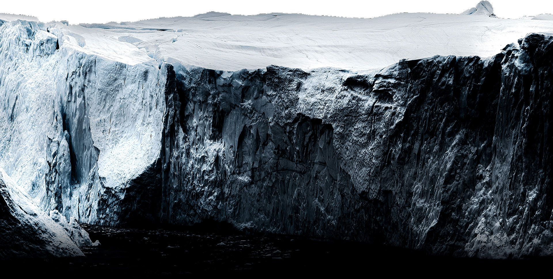 The words 'Super Black' appear in a bold font, and then a rugged iceberg with intricate grooves appears from below