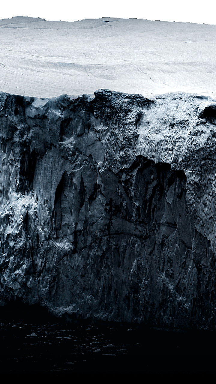 The words 'Super Black' appear in a bold font, and then a rugged iceberg with intricate grooves appears from below