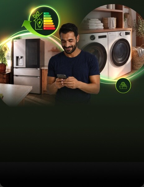 Un homme utilise un téléphone intelligent dans une buanderie moderne avec une laveuse, une sécheuse et un réfrigérateur LG, entouré de graphiques lumineux sur l'efficacité énergétique.