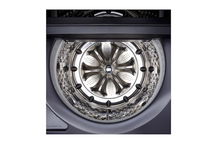 L'ensemble lave-linge et sèche-linge LG (WT8600CB) en Noir Acier, illustrant son design à plateau plat s'intégrant parfaitement sous les armoires de la buanderie.