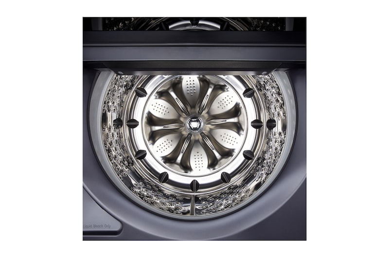 L'ensemble lave-linge et sèche-linge LG (WT8600CB) en Noir Acier, illustrant son design à plateau plat s'intégrant parfaitement sous les armoires de la buanderie.