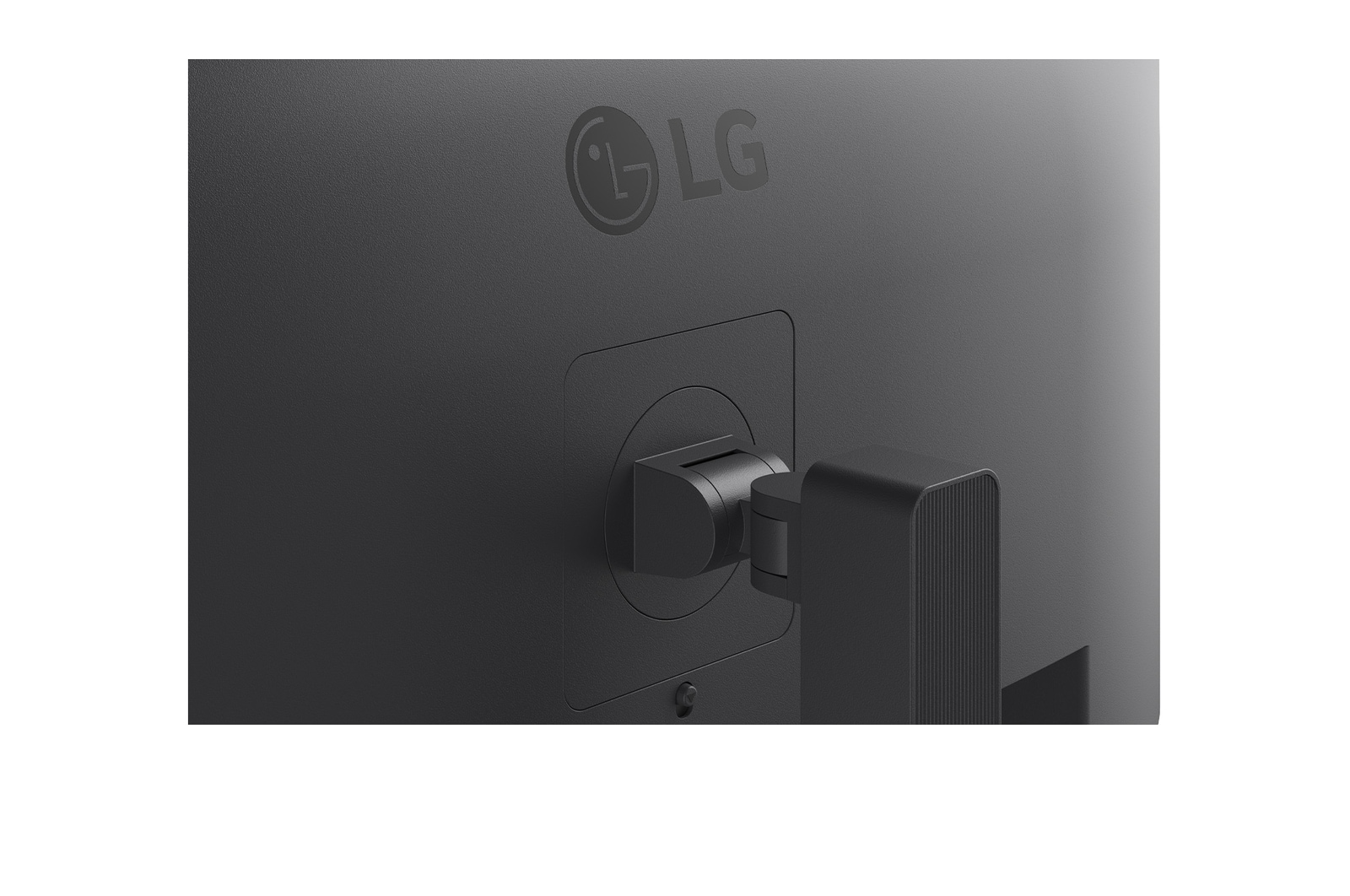 Rear angled view of monitor showing stand and ports (right)