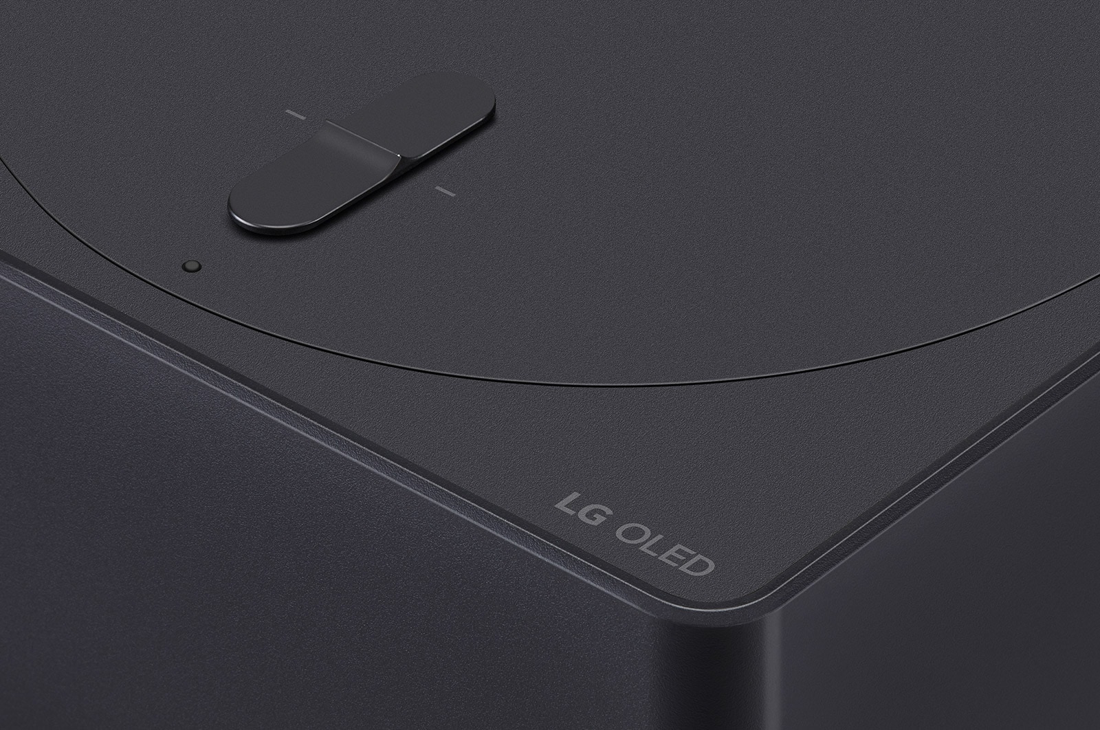 Slightly-angled close-up of the Zero Connect Box with the LG OLED logo on the edge
