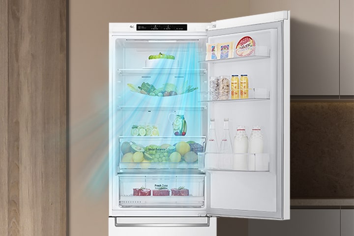 Réfrigérateur blanc ouvert rempli de produits frais avec un flux d'air bleu illustrant le système de refroidissement.