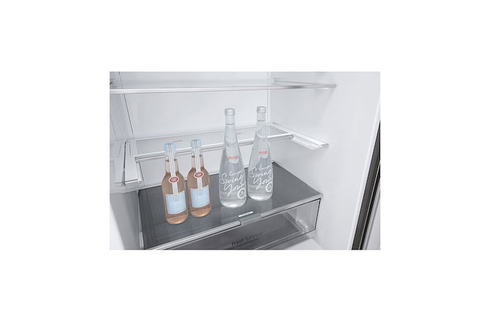 LG Réfrigérateur de 28 po à profondeur de comptoir d’une capacité de 15 pi³, avec congélateur au bas, fonctionnalité Refroidissement+ de la porte et tablette rabattable, LBNC15251V