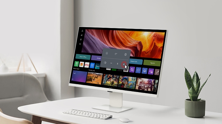 L’écran LG Smart Monitor Swing affiche l’interface webOS, et le volume est en cours d’augmentation.