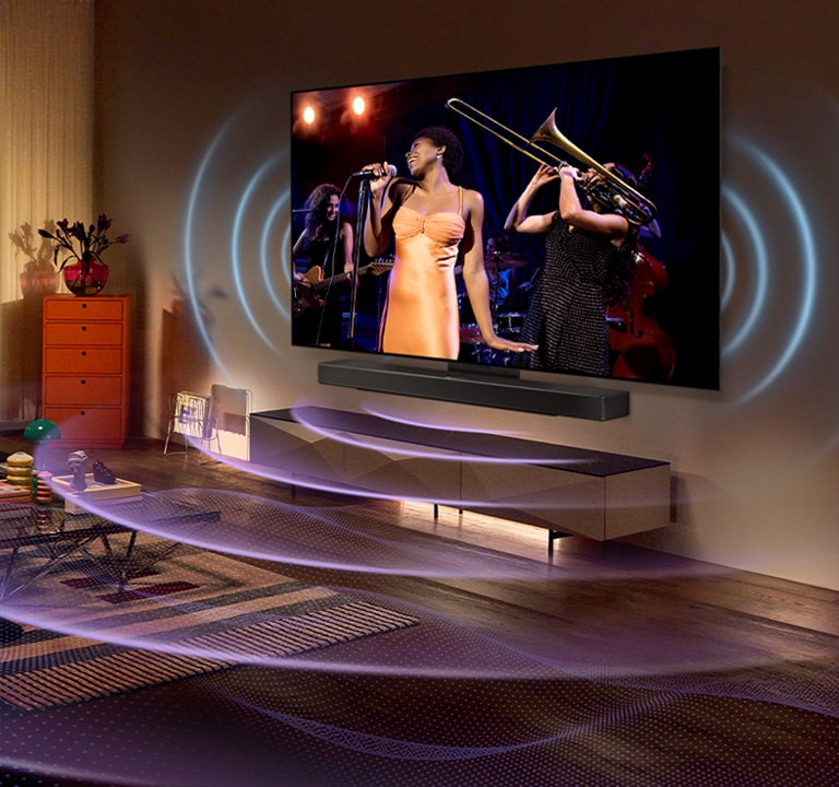 Une image d’un téléviseur LG OLED dans une pièce avec une performance musicale à l’écran. Des courbes bleues dépeignant le son du téléviseur et des courbes violettes exprimant la sonorité de la Barre de son remplissent l’espace.