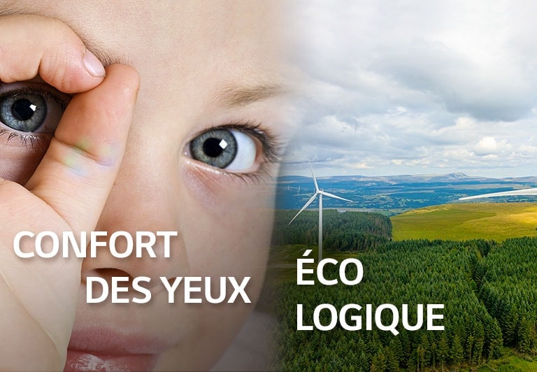 Un gros plan de l’œil d’un enfant à la gauche et un champ avec des éoliennes.