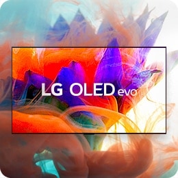 alt="A colourful abstract image of a flower is shown on the LG OLED evo display and expands out of the television onto the backdrop."