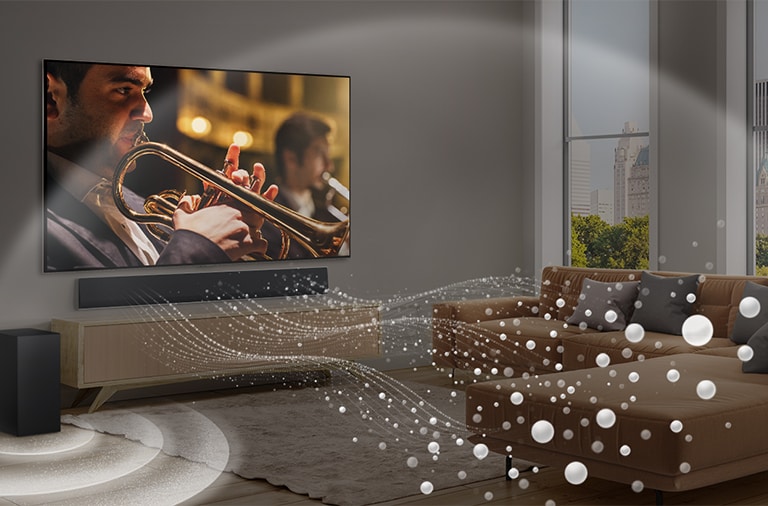 LG Soundbar, LG TV und ein Subwoofer stehen in einer modernen Stadtwohnung. Die LG Soundbar strahlt Schallwellen aus weissen Tröpfchen aus, die den Raum füllen, und ein Subwoofer erzeugt einen Klangeffekt von unten. Gemeinsam erzeugen sie einen Kuppeleffekt im Raum.