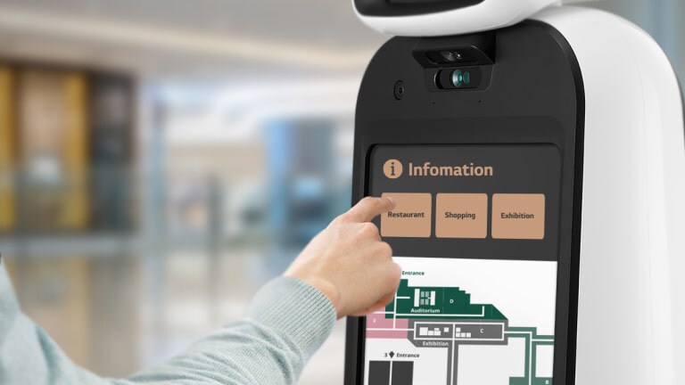 Une image de doigt touchant un bouton sur le produit