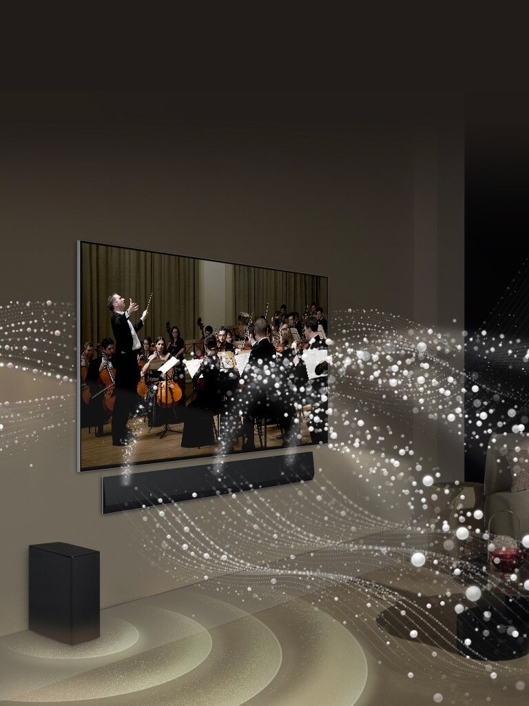 La LG Soundbar, la LG TV et le caisson de basse sont dans un salon diffusant un concert de musique classique. Des gouttelettes blanches font des vagues de son partant de la barre de son et sont projetées par la TV. Caisson de basse créant un effet sonore depuis la base.