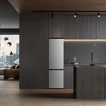 Réfrigérateur congélateur LG (gbbs726cpy) intégré dans une armoire marron foncé avec fenêtre et canapé à gauche et évier à droite