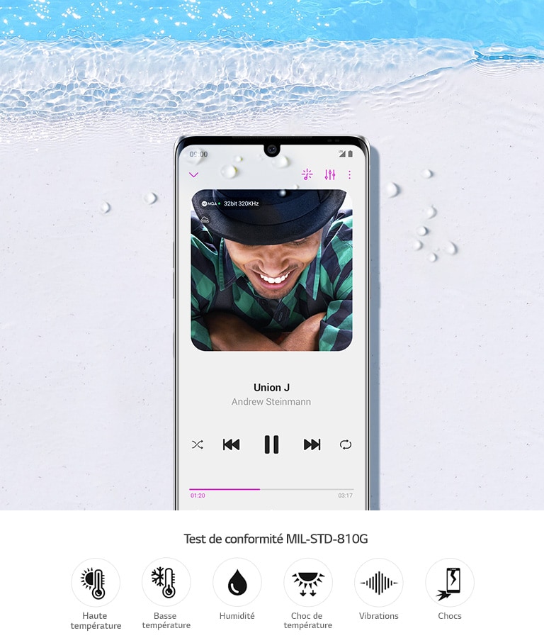 LG VELVET posé sur une plage de sable.