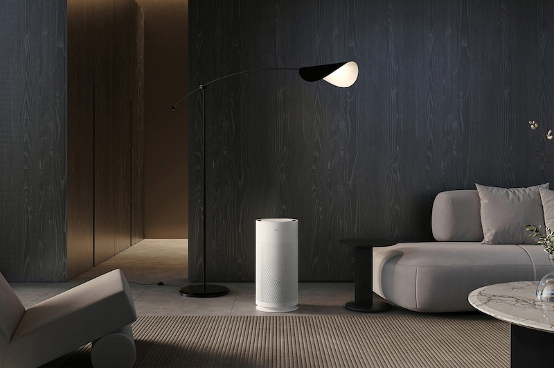 LG air purifier placed in a stylish living room and modern décor