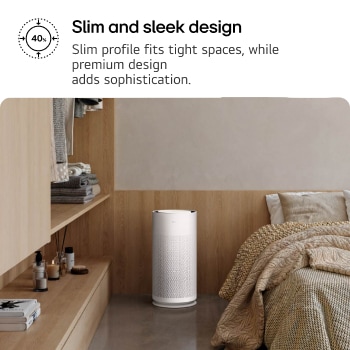 Compact white LG PuriCare™ AeroHit air purifier placed in a cozy bedroom corner beside a wooden shelf. Text reads 'Slim and sleek design: Slim profile fits tight spaces, while premium design adds sophistication'.
