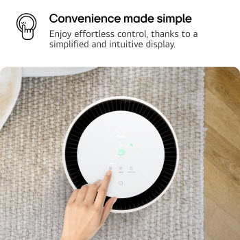 Top view of an LG PuriCare air purifier with a user’s hand interacting with the display, showing icons for settings. Text reads 'Convenience made simple: Enjoy effortless control, thanks to a simplified and intuitive display.'