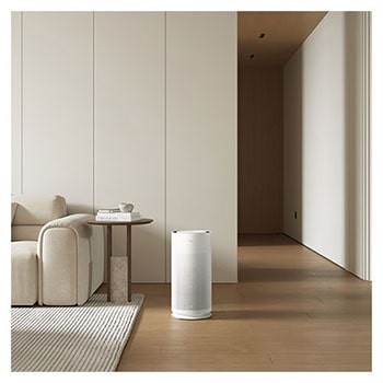 LG air purifier placed in a modern living room and minimalist furniture