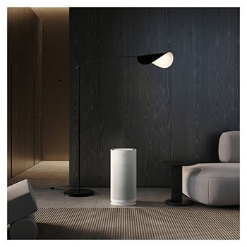 LG air purifier placed in a stylish living room and modern décor