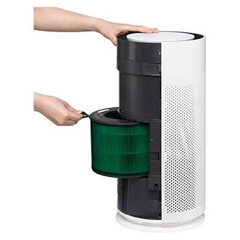 Pulling the filter forward to remove it from an LG air purifier