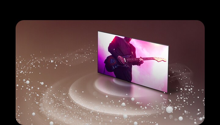 En un LG OLED TV se puede ver un concierto de guitarra que flota sobre un fondo de color malva claro. Del televisor se desprenden cuentas blancas de sonido y ondas que giran a su alrededor.