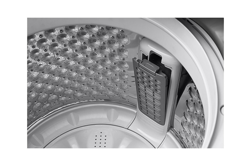 Lavadora LG WT18MV6, rendijas del tanque desde dentro.