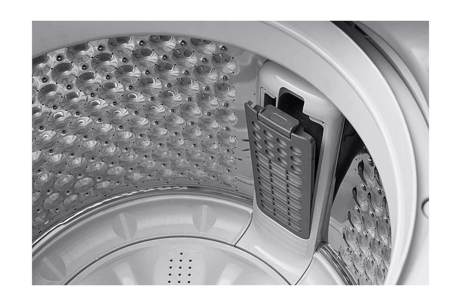 Lavadora LG WT19DV6, interior del tanque desde dentro.