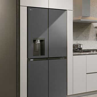 Modern kitchen interior with InstaView fridge.