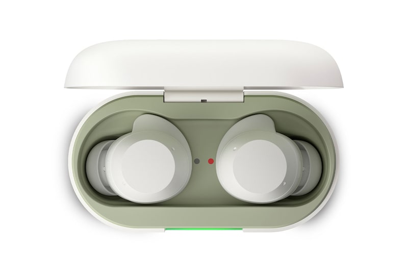opened cradle top view with earbuds