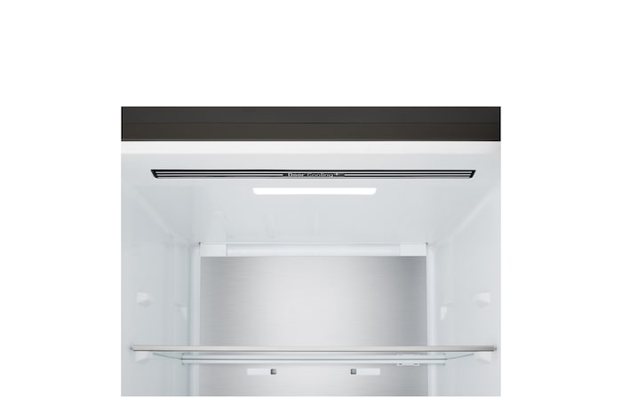 LG bottom freezer (GBBS726BEV) in living space with night city view overlaid with AI Saving Mode graphic and fluctuating energy chart