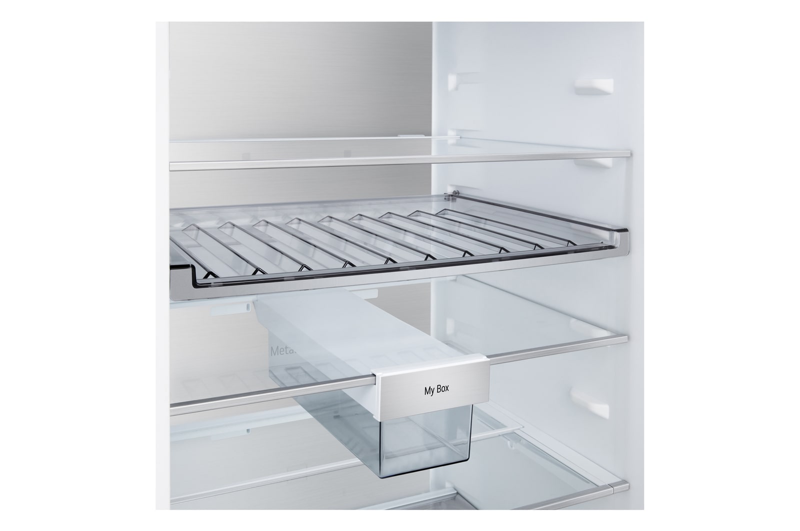 LG bottom freezer (GBBS726BEV) installed flush in tall warm beige wall with white arrows pointing to top side and front surfaces