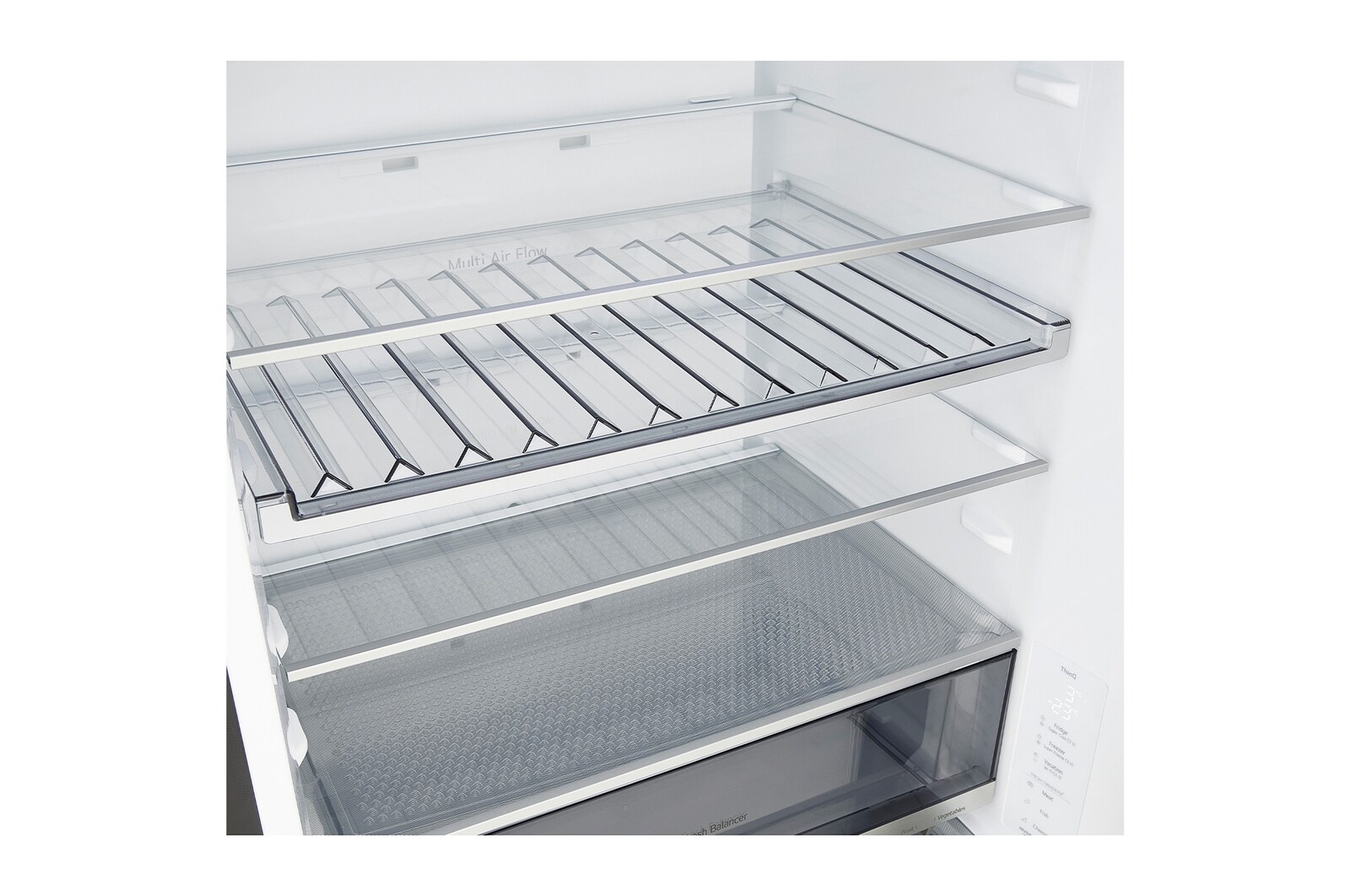 LG fridge freezer (GBBW726AEV) built into dark brown cabinetry with window and sofa on left and sink on right