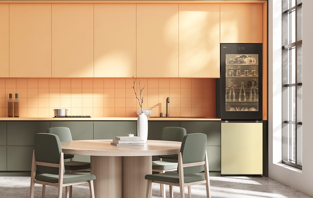 An image of a refrigerator placed in a yellow-toned kitchen.