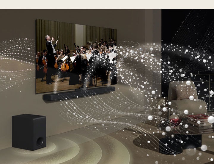 LG Soundbar, LG TV a subwoofer v obývacím pokoji přehrávají hudební představení. Bílé kapky vytvářejí zvukové vlny, které vystupují ze soundbaru směrem nahoru a dopředu a promítají se z televizoru. Subwoofer vytváří zvukový efekt zespodu.