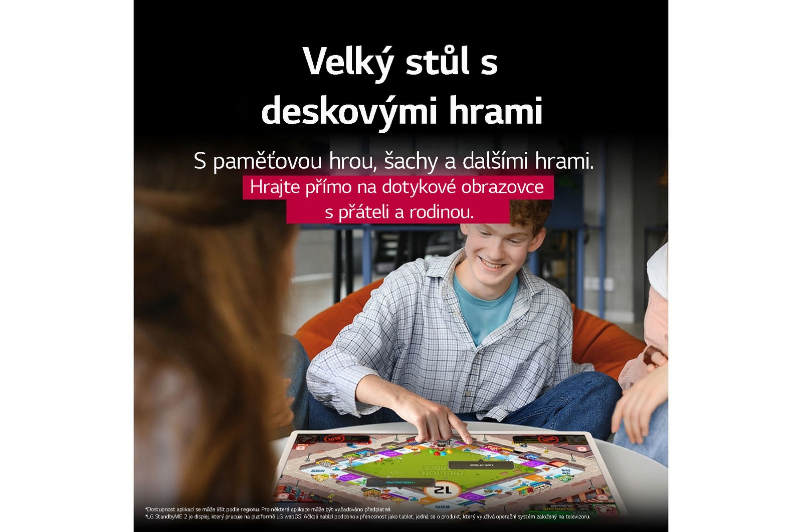 A group of friends playing a board game on the LG StanbyME 2 on the table. The Big Tablet Screen is featured. Text talks about playing directly on the touchscreen.