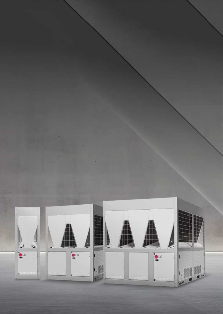 Three LG inverter scroll chillers are displayed in a space with minimalist concrete walls and soft lighting. 