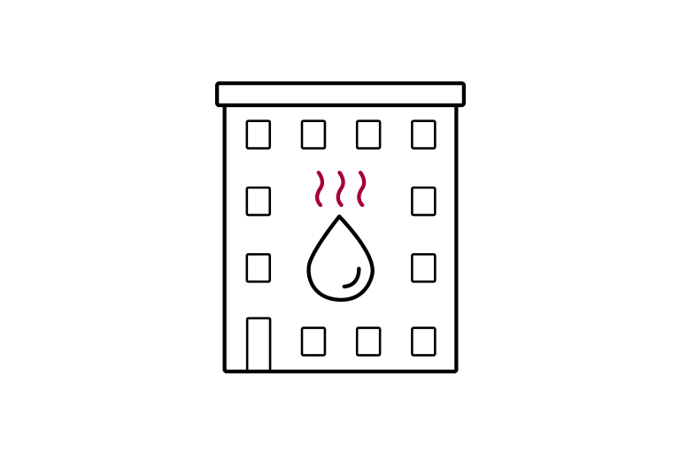 Komerční budova s ikonami kapek vody a párou představující topnou funkci.