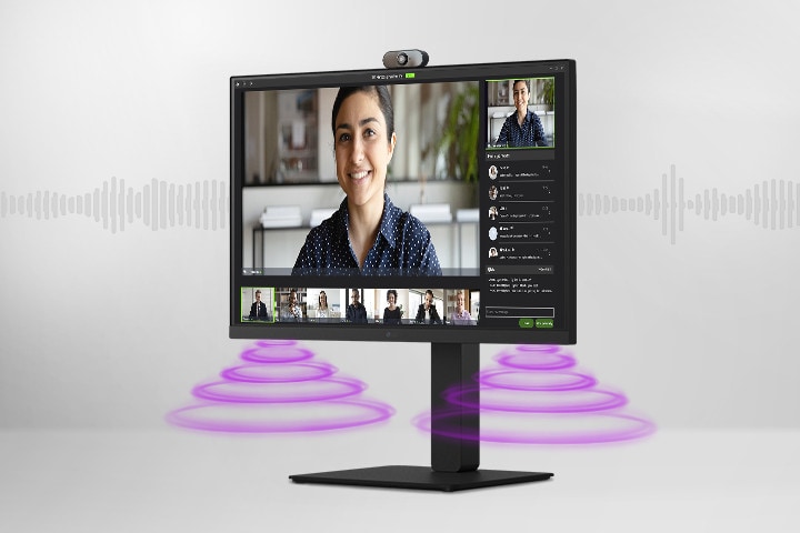 Boční pohled zobrazující scénu videokonference na monitoru.