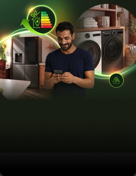 Mann nutzt ein Smartphone in einer modernen Waschküche mit LG Waschmaschine, Trockner und Kühlschrank, umgeben von leuchtenden Energieeffizienz-Grafiken.